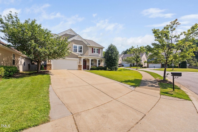 200 Woodvale Way, Fuquay Varina, NC 27526 - craftsman-style house featuring driveway, a front lawn, and stone siding