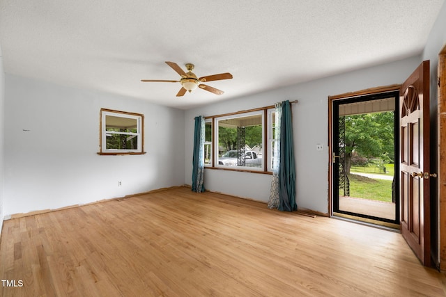 218 Forestville Rd, Wake Forest, NC 27587 - spare room with light wood-type flooring, plenty of natural light, and a ceiling fan