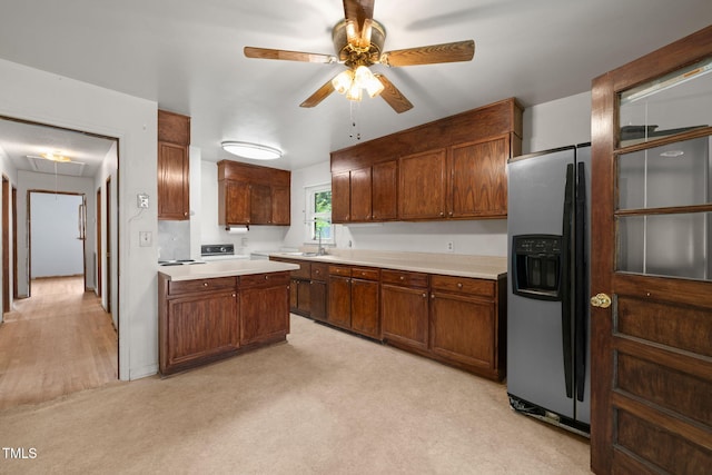 218 Forestville Rd, Wake Forest, NC 27587 - kitchen with stainless steel fridge with ice dispenser, a ceiling fan, light countertops, and light carpet