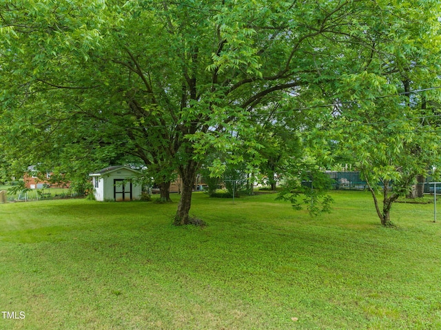 218 Forestville Rd, Wake Forest, NC 27587 - view of yard featuring a shed