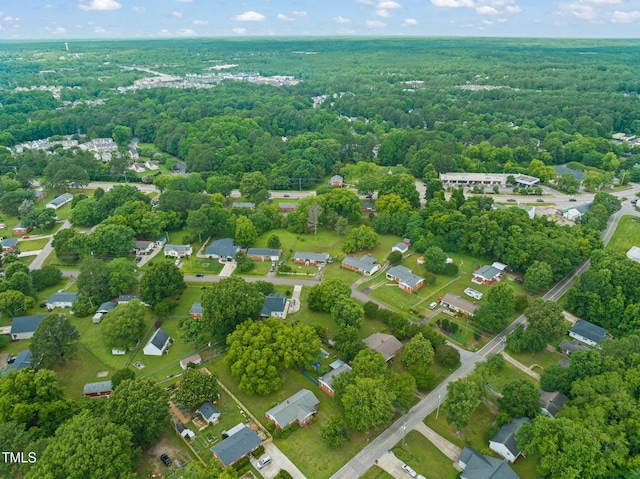 218 Forestville Rd, Wake Forest, NC 27587 - view of property location with a heavily wooded area