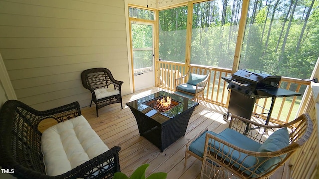 966 Airedale Trl, Garner, NC 27529 - sunroom with an outdoor fire pit