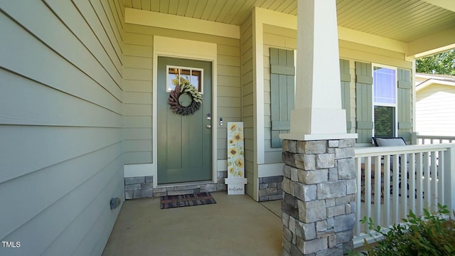 966 Airedale Trl, Garner, NC 27529 - view of exterior entry with covered porch and stone siding