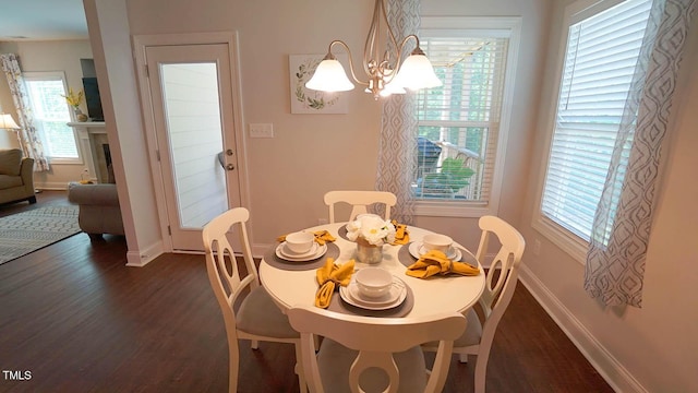 966 Airedale Trl, Garner, NC 27529 - dining room featuring dark wood-style flooring and healthy amount of natural light