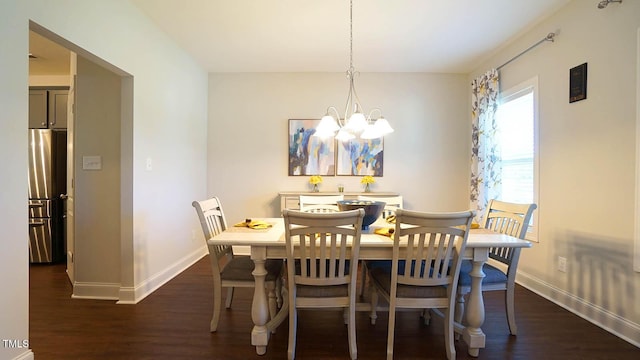966 Airedale Trl, Garner, NC 27529 - dining room featuring dark wood finished floors and a chandelier