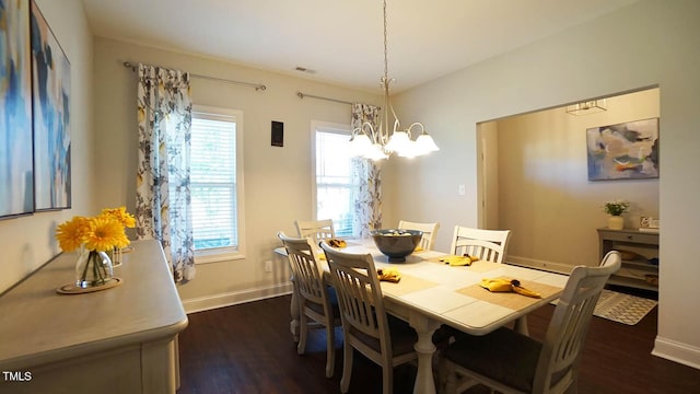 966 Airedale Trl, Garner, NC 27529 - dining space featuring a chandelier and dark wood-type flooring
