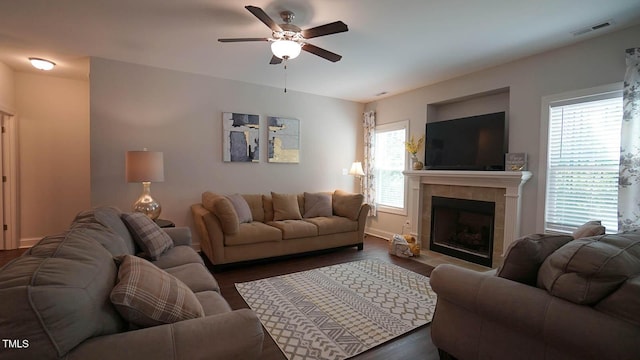 966 Airedale Trl, Garner, NC 27529 - living area with a ceiling fan, healthy amount of natural light, dark wood-style floors, and a fireplace