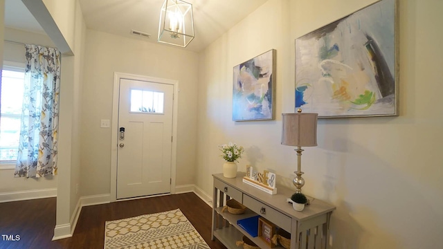 966 Airedale Trl, Garner, NC 27529 - foyer entrance with wood finished floors and a chandelier
