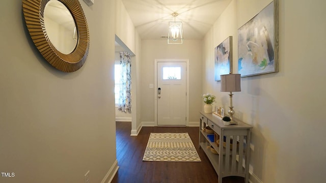 966 Airedale Trl, Garner, NC 27529 - foyer entrance with wood finished floors and baseboards