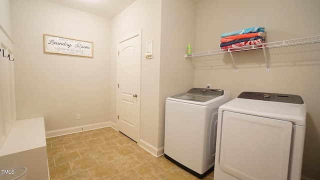 966 Airedale Trl, Garner, NC 27529 - washroom featuring washer and clothes dryer and baseboards