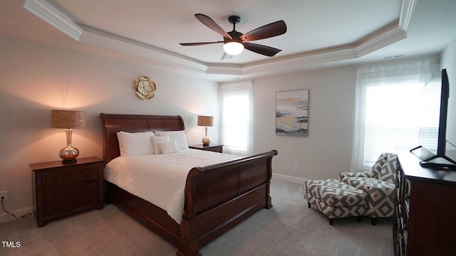 966 Airedale Trl, Garner, NC 27529 - bedroom featuring a tray ceiling, ornamental molding, light colored carpet, and ceiling fan