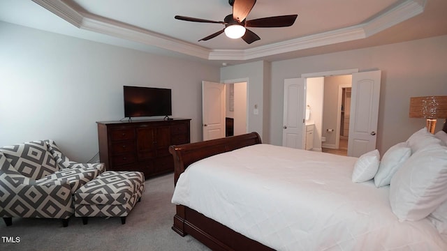 966 Airedale Trl, Garner, NC 27529 - carpeted bedroom featuring a raised ceiling, ornamental molding, ensuite bath, and ceiling fan