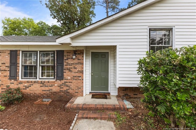 6108 Lonestar Rd, Fayetteville, NC 28303 - entrance to property with brick siding and crawl space