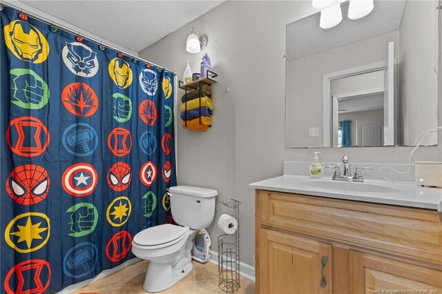 6108 Lonestar Rd, Fayetteville, NC 28303 - bathroom featuring vanity, tile patterned flooring, a textured ceiling, and a shower with shower curtain