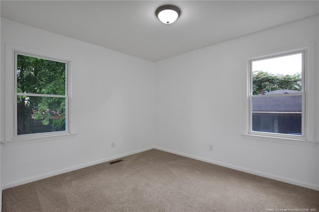 2032 Biltmore Dr, Fayetteville, NC 28304 - spare room with carpet flooring and baseboards