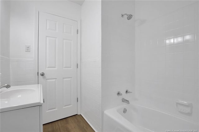 2032 Biltmore Dr, Fayetteville, NC 28304 - bathroom with shower / tub combination, vanity, and wood finished floors