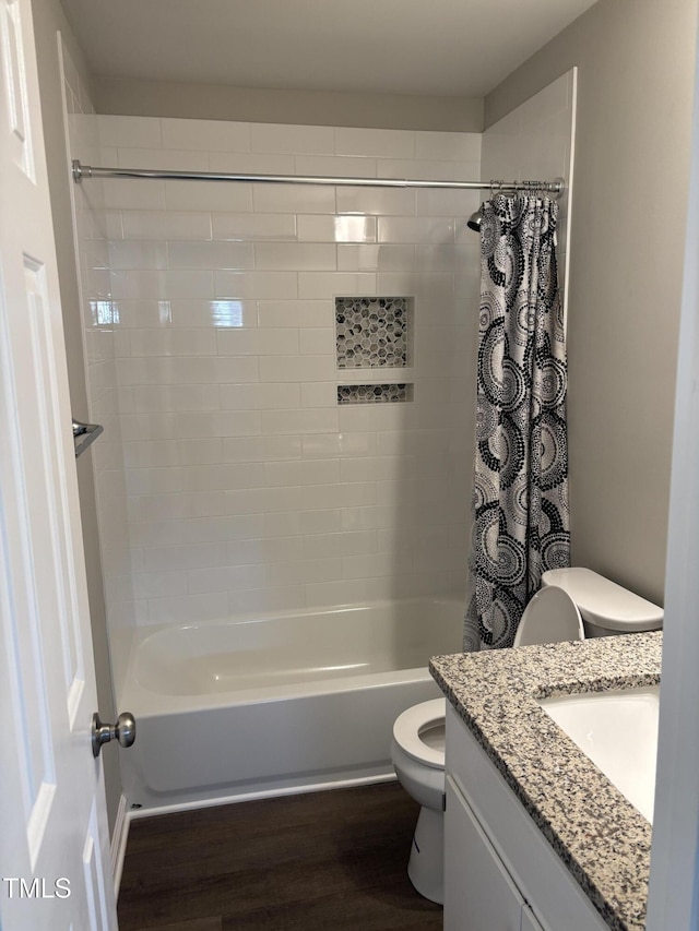510 N St, Graham, NC 27253 - full bathroom featuring wood finished floors, shower / bath combination with curtain, and vanity
