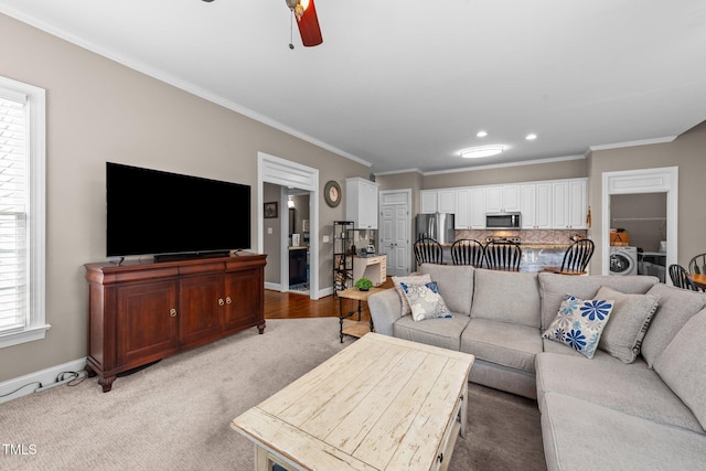 124 Kingsport Rd, Holly Springs, NC 27540 - living room with ornamental molding, ceiling fan, washer / dryer, recessed lighting, and light colored carpet