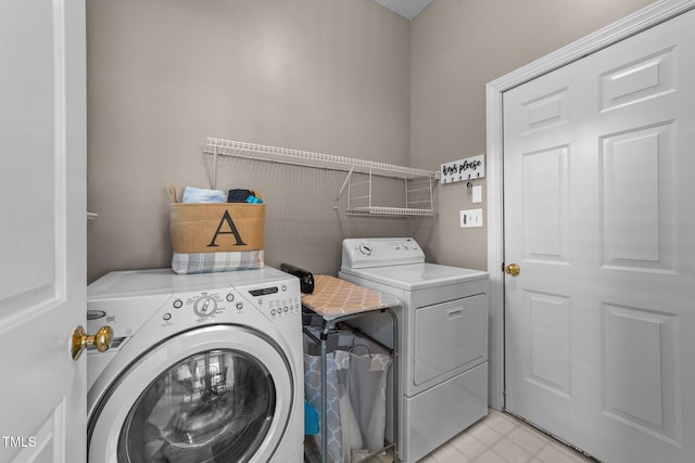 124 Kingsport Rd, Holly Springs, NC 27540 - laundry area featuring washing machine and clothes dryer