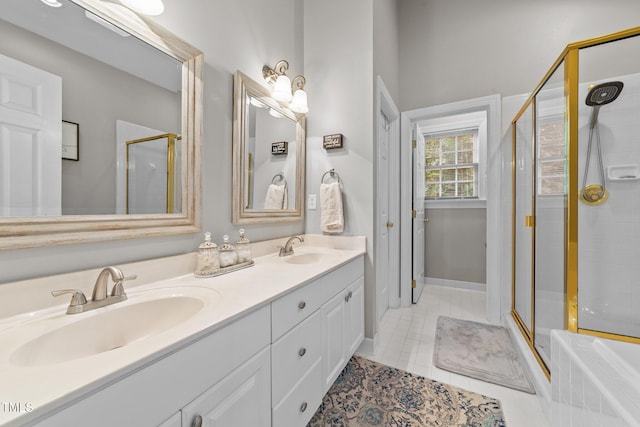 124 Kingsport Rd, Holly Springs, NC 27540 - full bathroom featuring a shower stall, double vanity, and tile patterned flooring