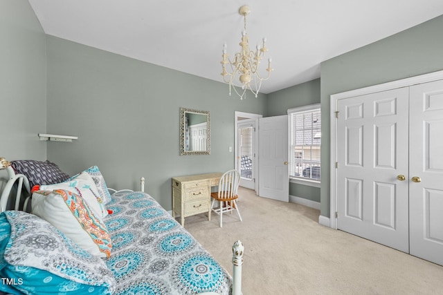 124 Kingsport Rd, Holly Springs, NC 27540 - bedroom featuring a chandelier, carpet floors, and a closet