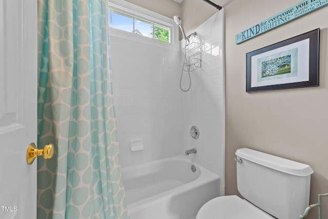 124 Kingsport Rd, Holly Springs, NC 27540 - bathroom featuring shower / tub combo and toilet