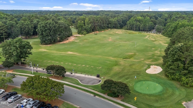 124 Kingsport Rd, Holly Springs, NC 27540 - aerial view of property and surrounding area with a forest and a golf course