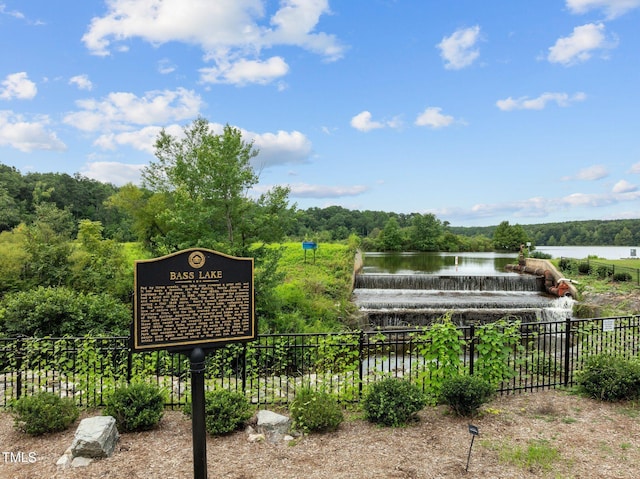 124 Kingsport Rd, Holly Springs, NC 27540 - surrounding community with a water view and a view of trees