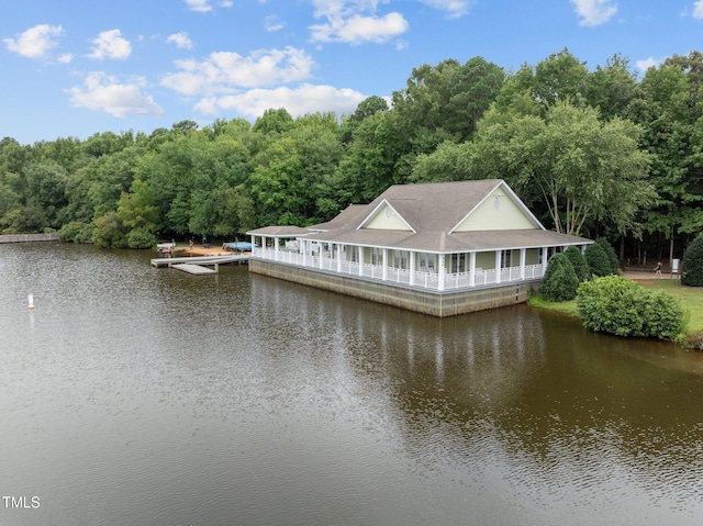 124 Kingsport Rd, Holly Springs, NC 27540 - dock with a water view and a view of trees