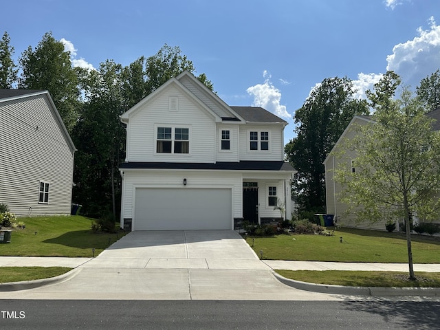 2417 Tobacco Root Dr, Raleigh, NC 27616 - view of front of home featuring an attached garage, a front lawn, and concrete driveway