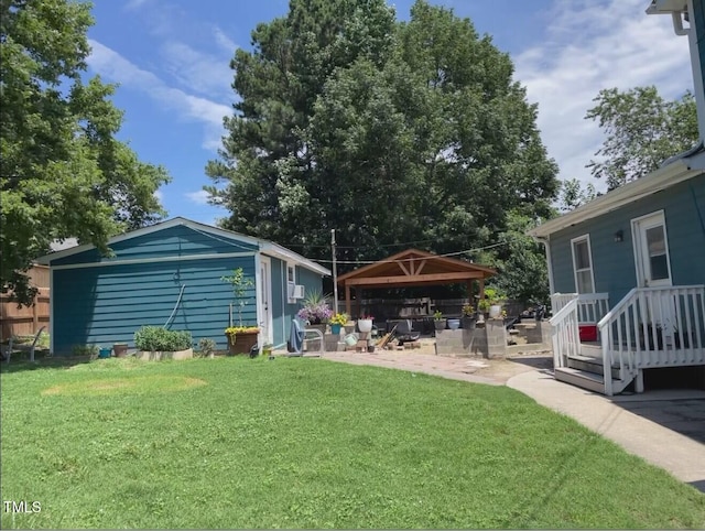 3129 Skycrest Dr, Raleigh, NC 27604 - view of green lawn featuring a gazebo and a patio area