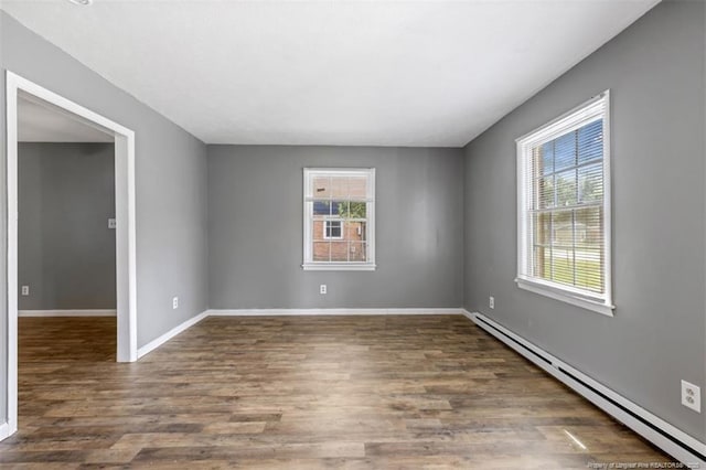 6547 Amanda Cir, Fayetteville, NC 28304 - unfurnished room with baseboard heating and wood finished floors