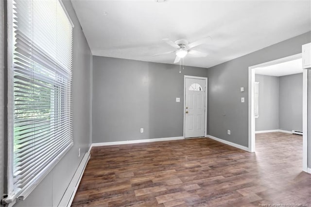 6547 Amanda Cir, Fayetteville, NC 28304 - foyer entrance featuring a ceiling fan, a baseboard radiator, and wood finished floors