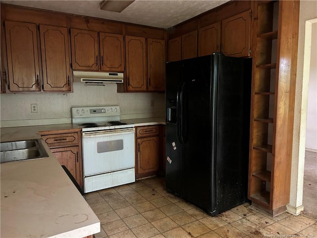 1580 Arthur Rd, Red Springs, NC 28377 - kitchen featuring black fridge, white range with electric cooktop, open shelves, under cabinet range hood, and light countertops