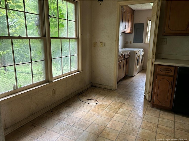 1580 Arthur Rd, Red Springs, NC 28377 - kitchen with light countertops, electric panel, black dishwasher, and washing machine and clothes dryer