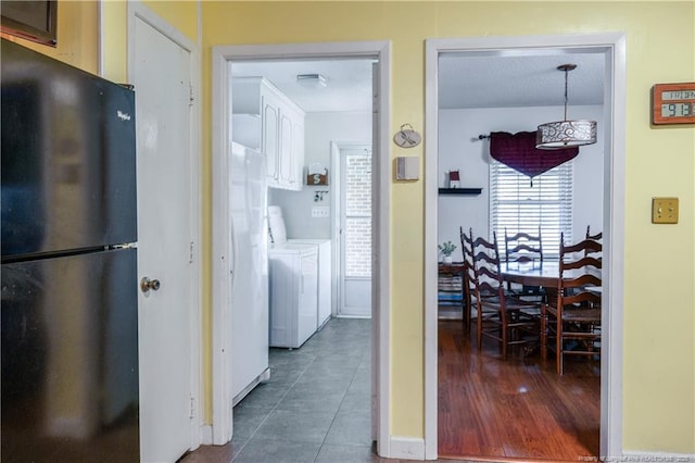 6733 Newton Grove Hwy, Newton Grove, NC 28366 - hallway featuring separate washer and dryer and tile patterned floors