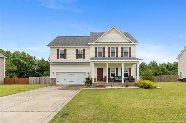 229 Red Oak Ct, Raeford, NC 28376 - view of front of house featuring covered porch, driveway, an attached garage, and a shingled roof