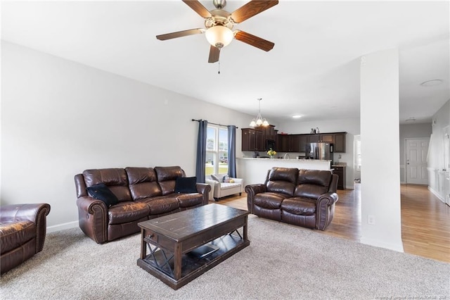 229 Red Oak Ct, Raeford, NC 28376 - living area featuring light carpet and a ceiling fan