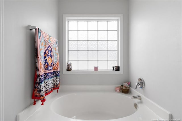 229 Red Oak Ct, Raeford, NC 28376 - bathroom featuring healthy amount of natural light and a bath