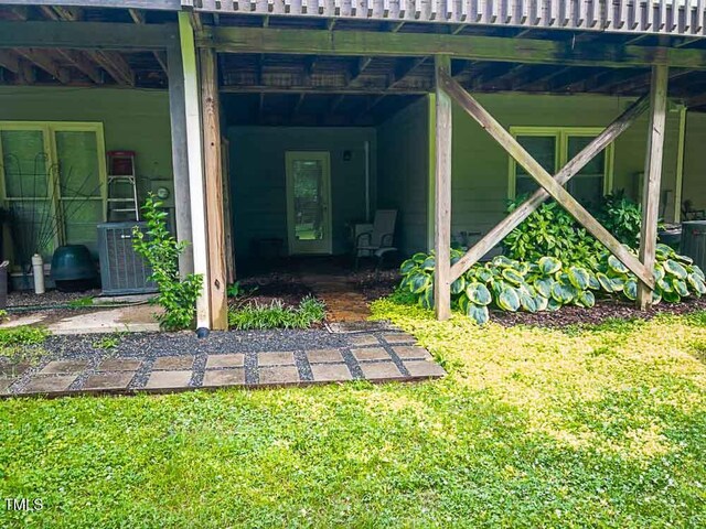 5500 Fortunes Ridge Dr Unit 94C, Durham, NC 27713 - view of exterior entry featuring a lawn