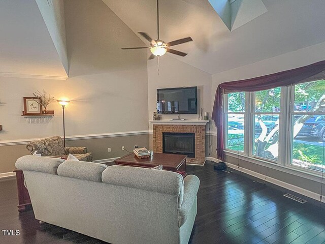 5500 Fortunes Ridge Dr Unit 94C, Durham, NC 27713 - living room with a fireplace, vaulted ceiling, ceiling fan, and dark wood-style floors