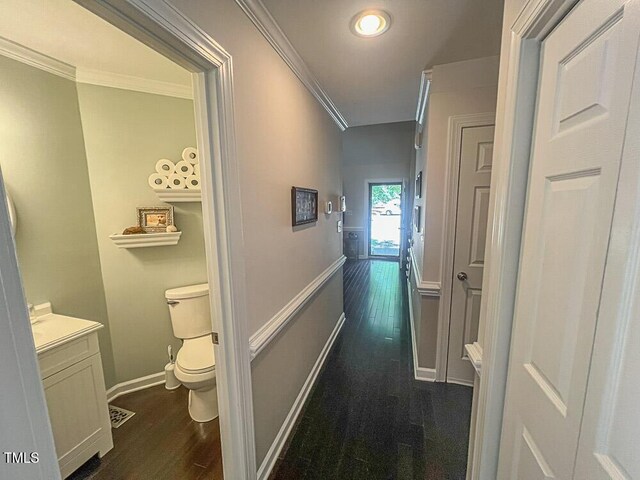 5500 Fortunes Ridge Dr Unit 94C, Durham, NC 27713 - hall with dark wood-type flooring and crown molding