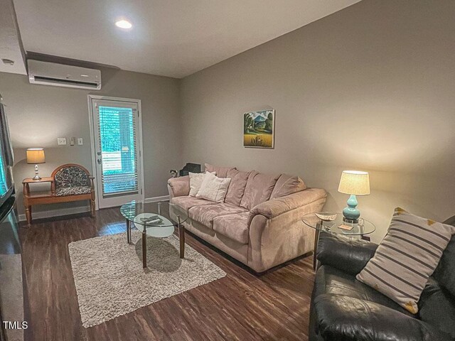 5500 Fortunes Ridge Dr Unit 94C, Durham, NC 27713 - living area with a wall mounted AC, wood finished floors, and recessed lighting