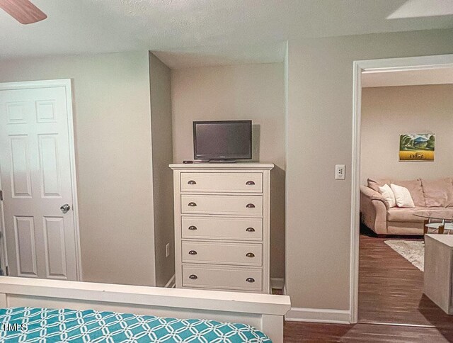 5500 Fortunes Ridge Dr Unit 94C, Durham, NC 27713 - bedroom with dark wood-type flooring and baseboards