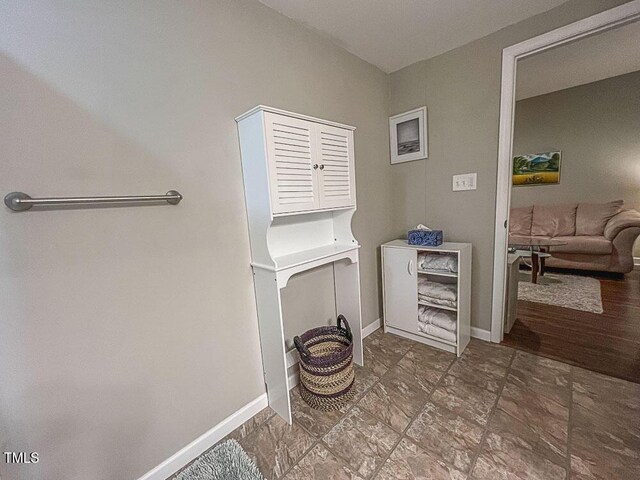 5500 Fortunes Ridge Dr Unit 94C, Durham, NC 27713 - laundry area featuring baseboards