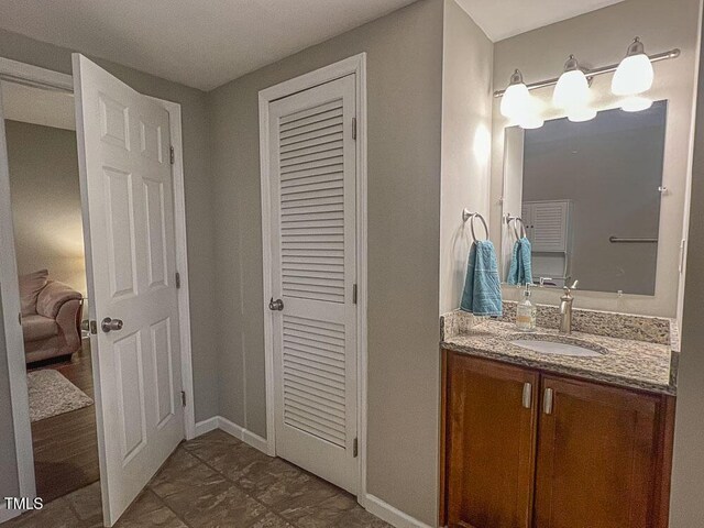 5500 Fortunes Ridge Dr Unit 94C, Durham, NC 27713 - bathroom with vanity and baseboards