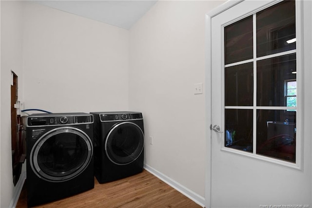 262 Shads Ford Blvd, Fayetteville, NC 28314 - laundry room featuring wood finished floors and washer and dryer