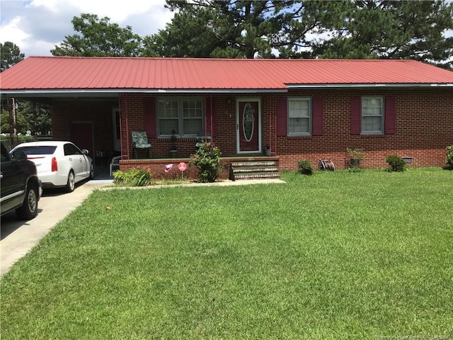 108 Thurlow St, Red Springs, NC 28377 - ranch-style house with a carport, covered porch, a front yard, brick siding, and a metal roof