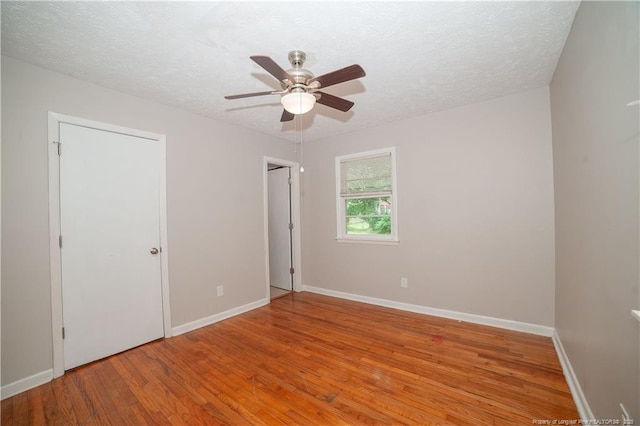 6310 Glenlea Cir, Fayetteville, NC 28314 - unfurnished bedroom with light wood finished floors, a textured ceiling, and ceiling fan