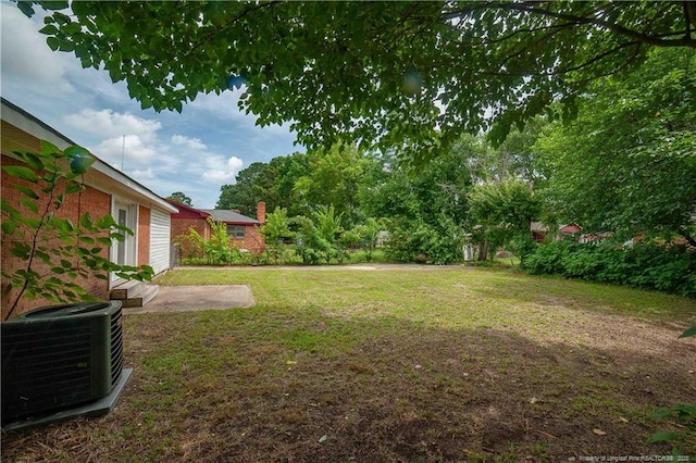 6310 Glenlea Cir, Fayetteville, NC 28314 - view of green lawn featuring a patio
